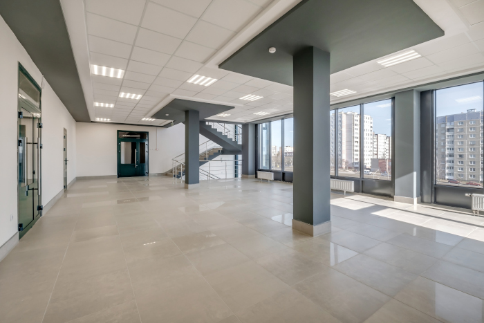 empty modern hall room with columns, doors and panoramic windows
